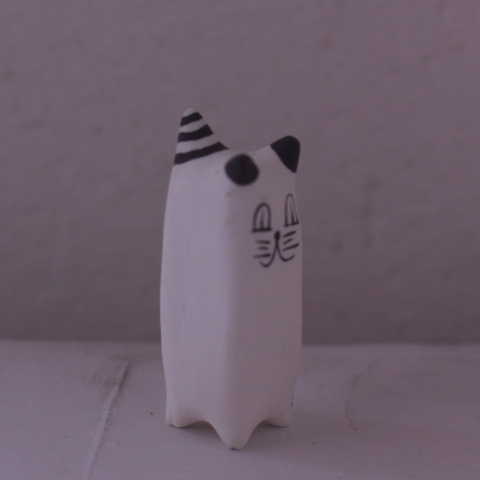 Handmade Clay Cat Figurine with black and white painted details by various artist