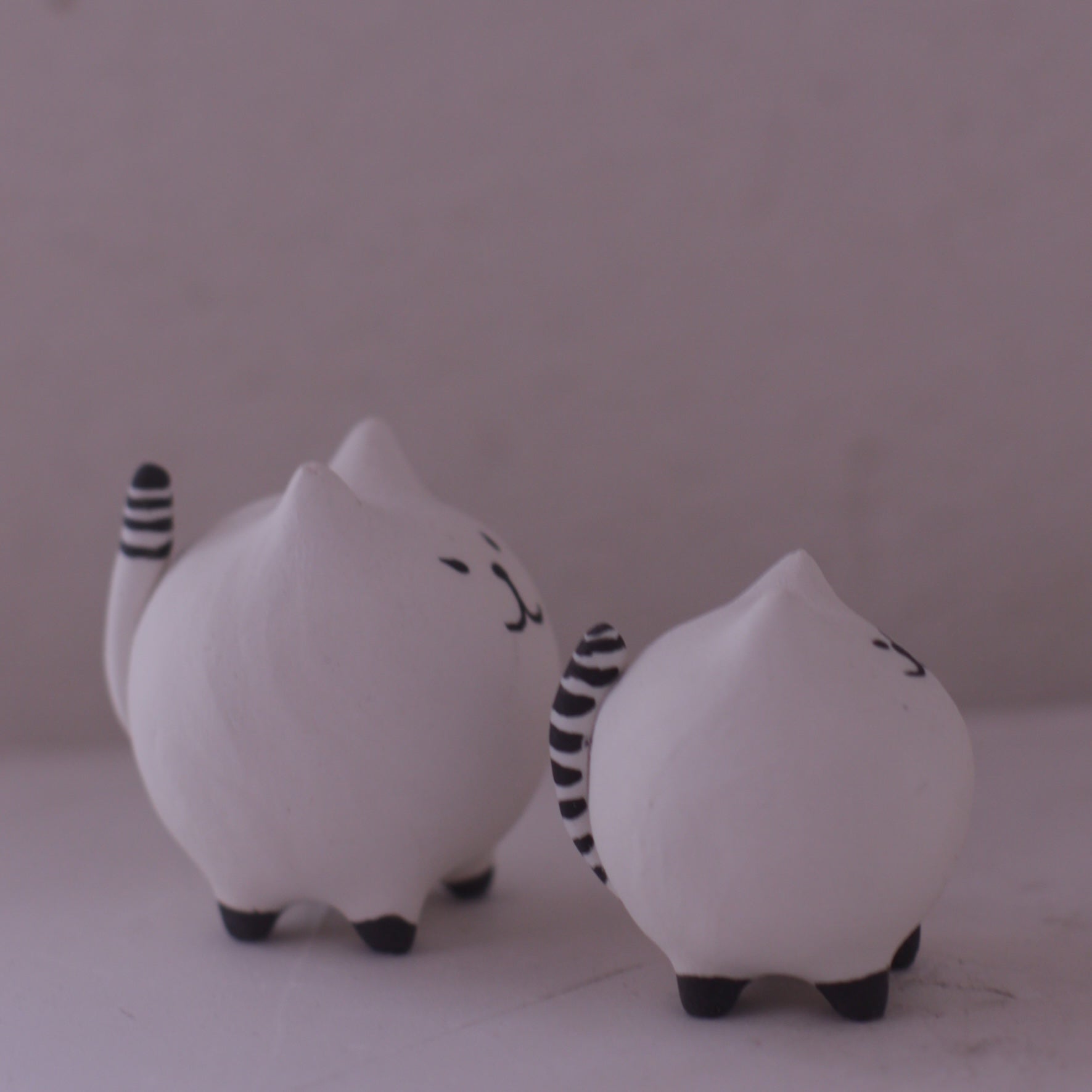 Handmade Clay Cat Figurine set with white round bodies and striped tails by various artist