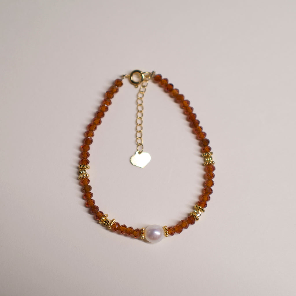 AuroraGems Colorful Necklace with amber beads gold accents and a central white pearl from ARCHEAST