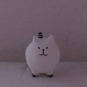 Handmade Clay Cat Figurine with minimalist design and black striped tail by various artist