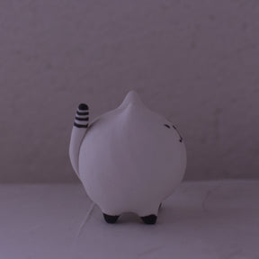 Handmade Clay Cat Figurine with round body and striped tail in white and black colors
