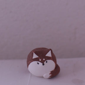 Handmade pottery clay fox figurine in brown and white by various artist