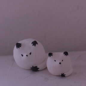 Handmade white Clay Fox Figurine pottery animal sculptures with black details by various artists